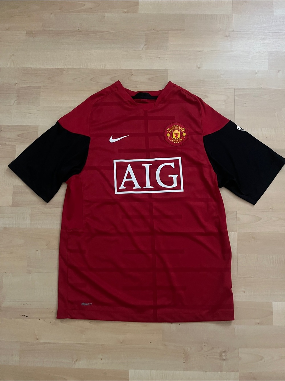 Nike Manchester United Men's Dri-FIT Football Jersey with Black Neck Trim